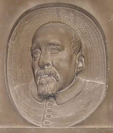 a photo of a carving memorializing Robert Recorde showing his face